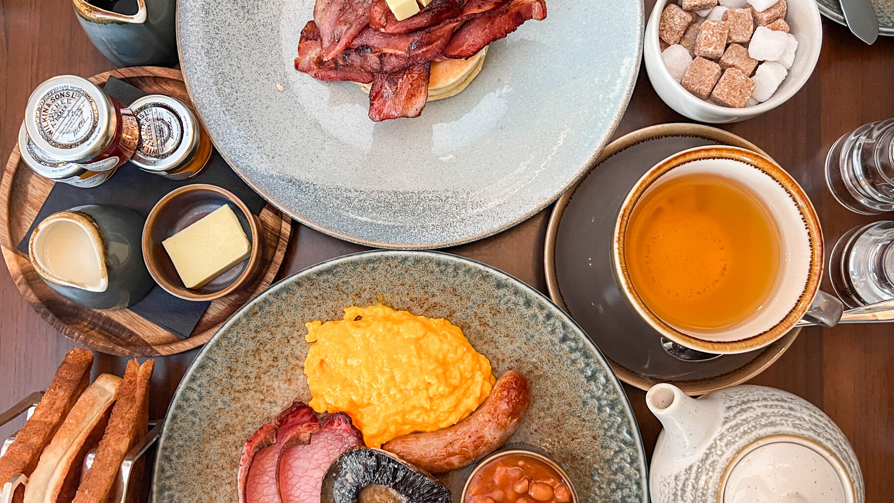 Breakfast dishes on table in hotel.