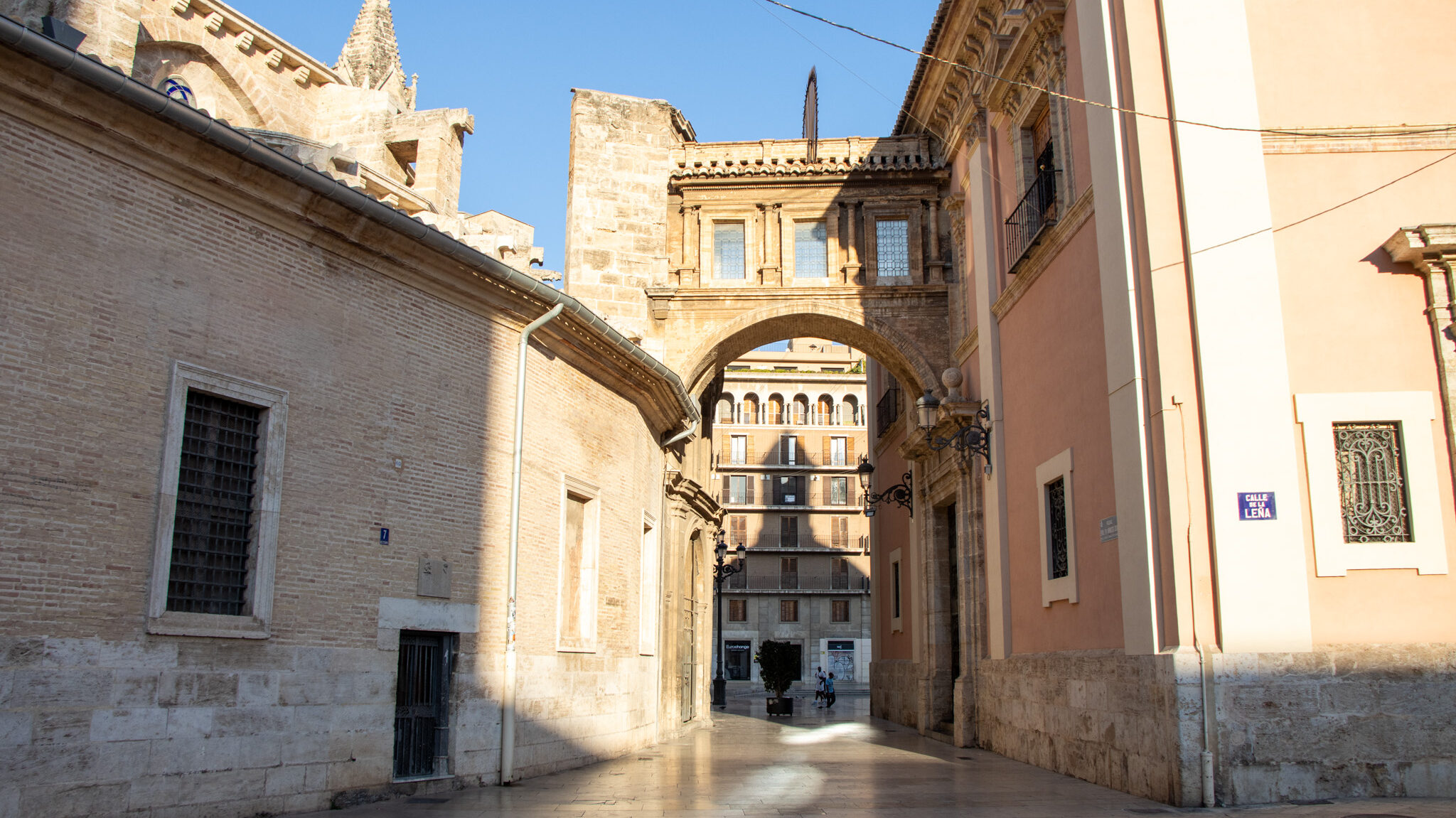 Arch passageway next to cathedral in old town.