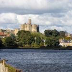 View of a castle across a lake.