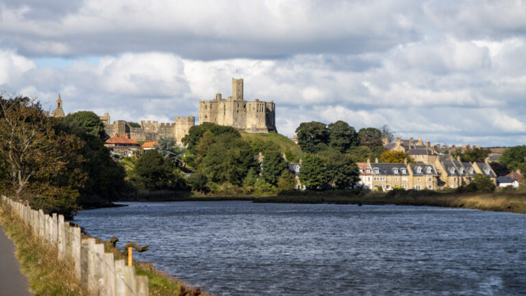 View of a castle across a lake.