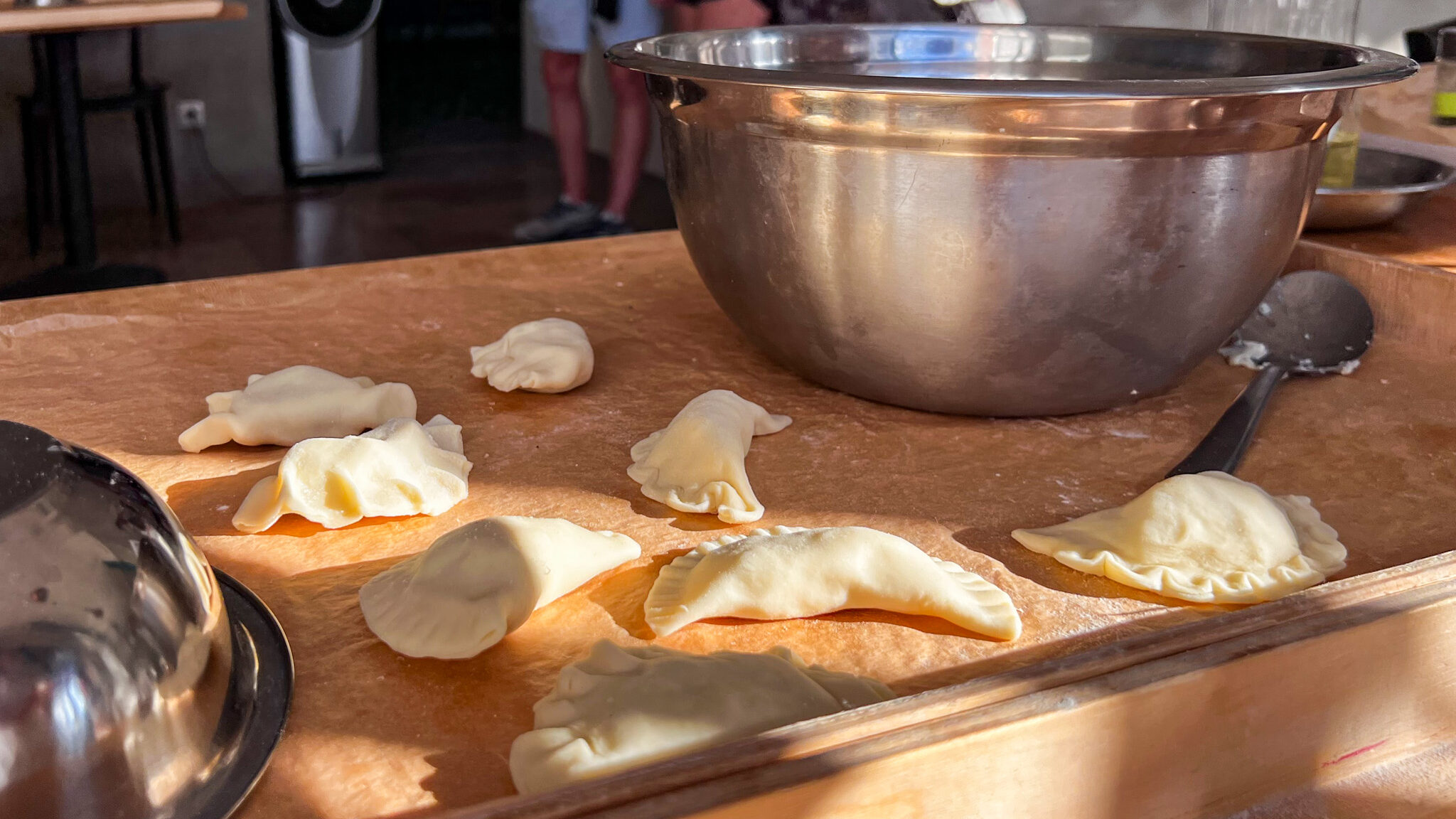 Selection of freshly rolled pierogies in cooking class.