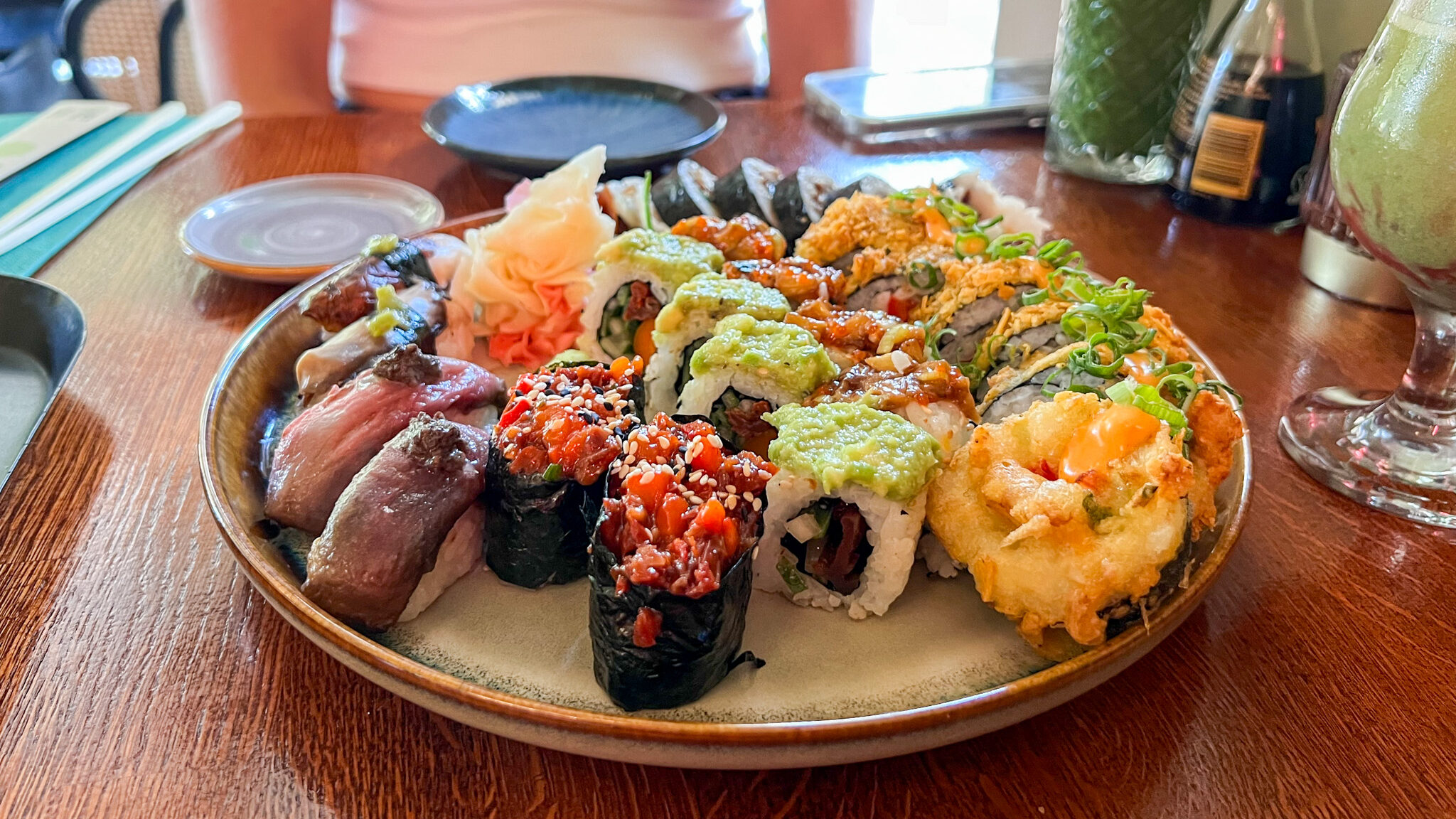 Plate filled with vegan sushi.