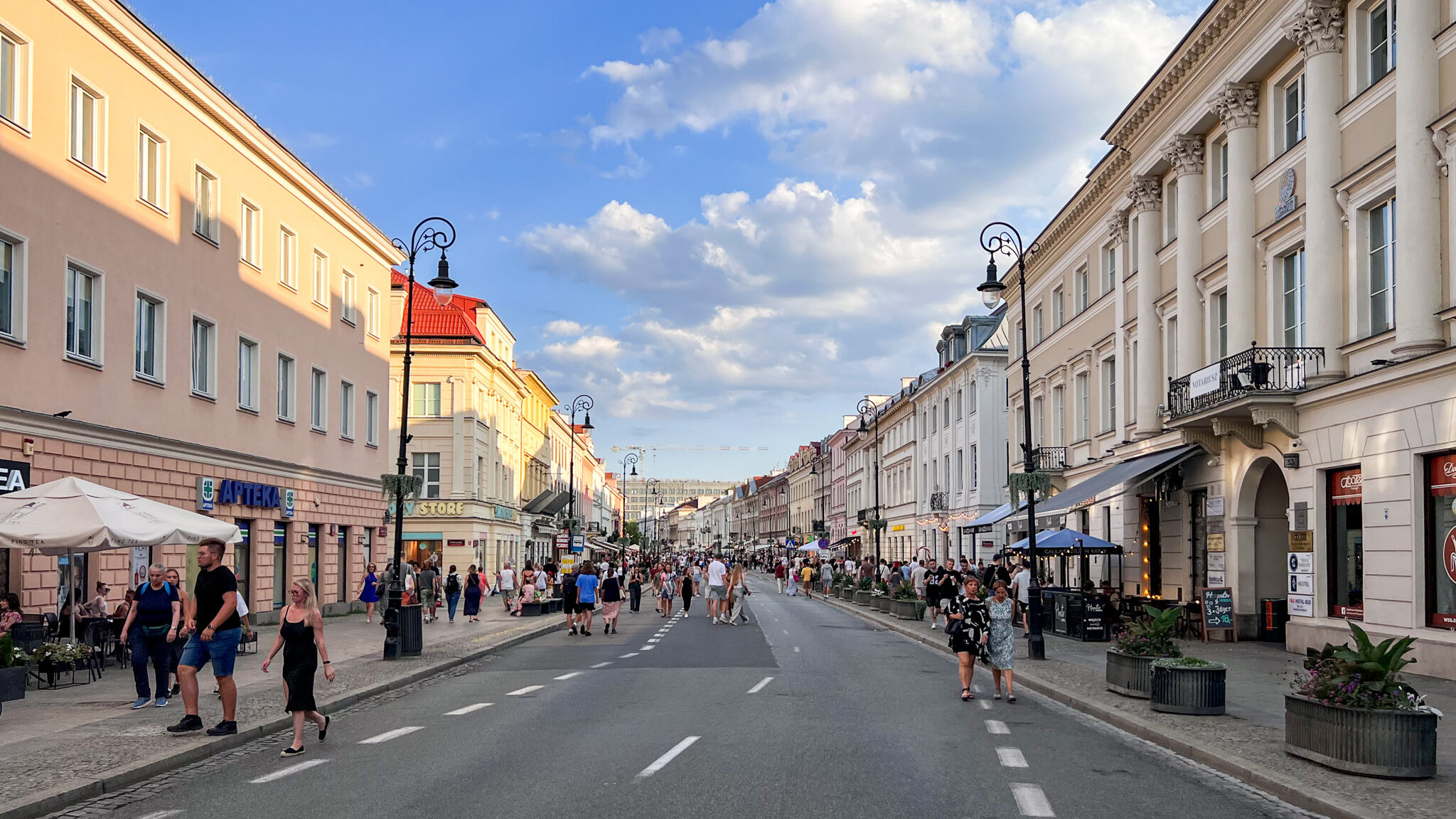 Shopping street in Warsaw at sunset.