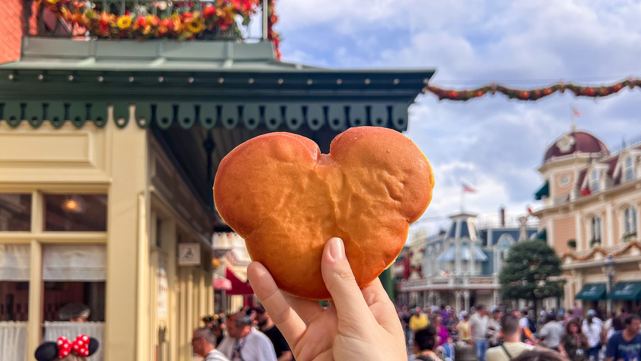 Beignet in the shape of Mickey Mouse head.