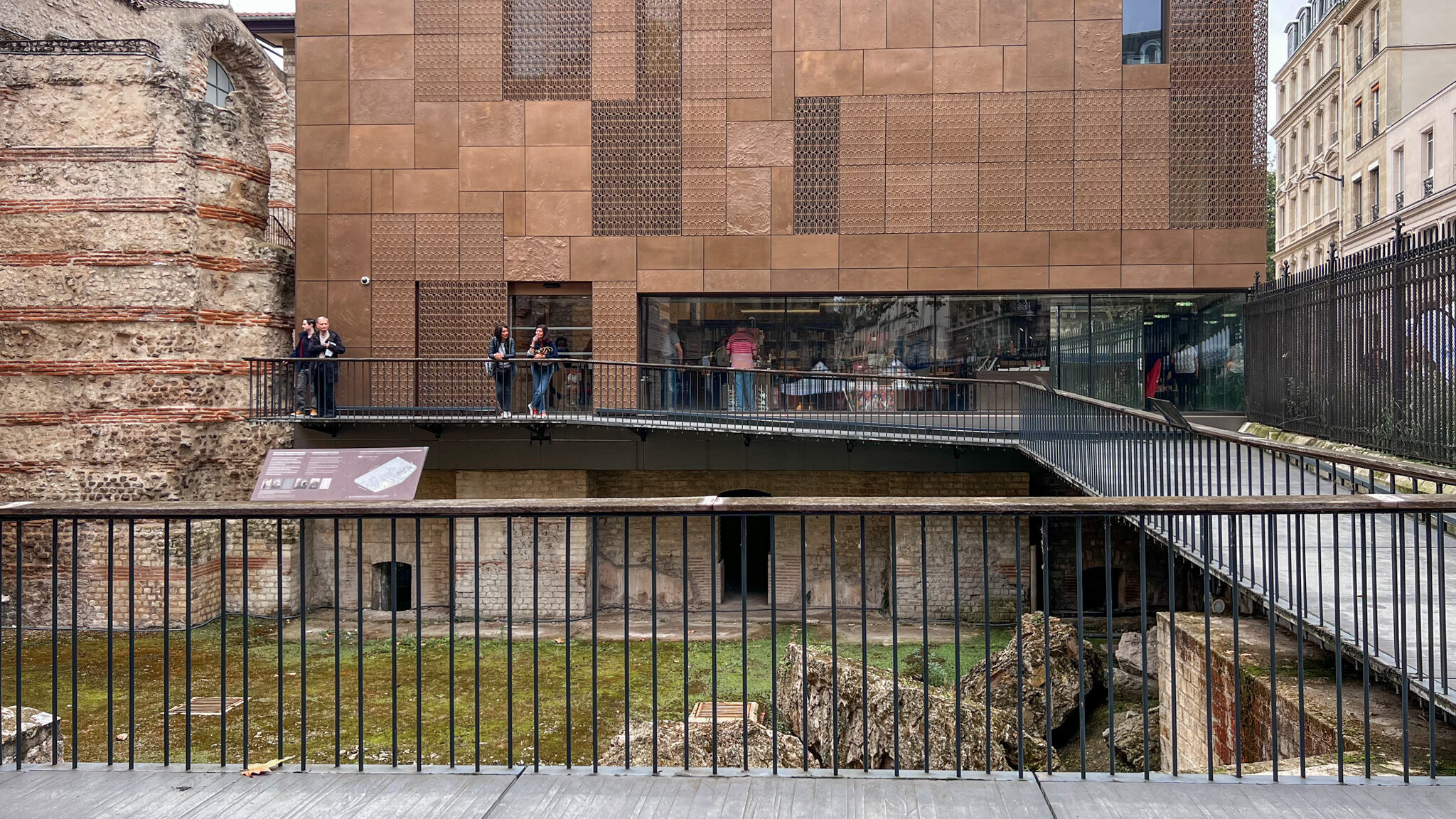 Medieval museum with thermal baths outside.