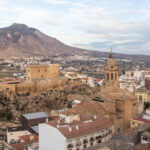 Viewpoint of Spanish town with church in the centre.