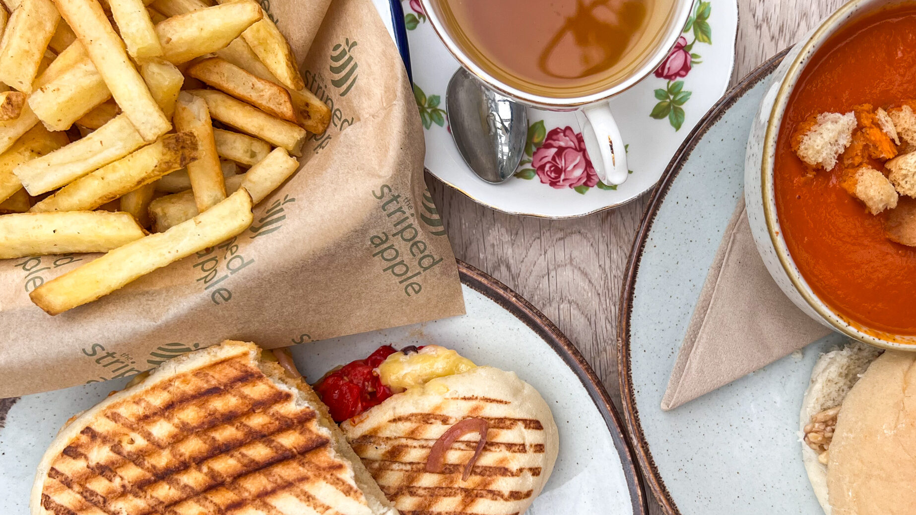 Seasonal soup and wrap with fries and tea.