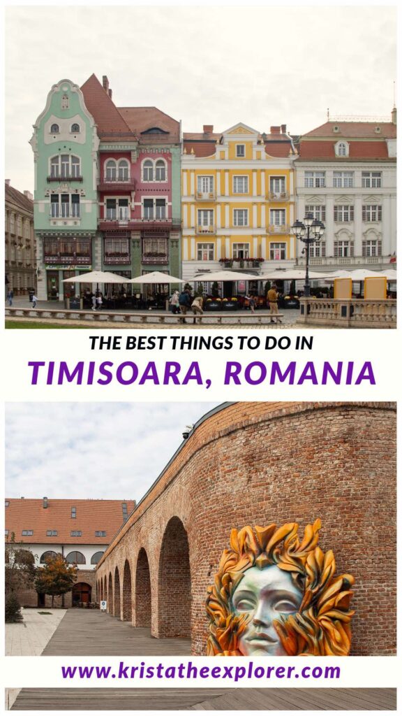 Row of colourful buildings and art installation against bastion wall.