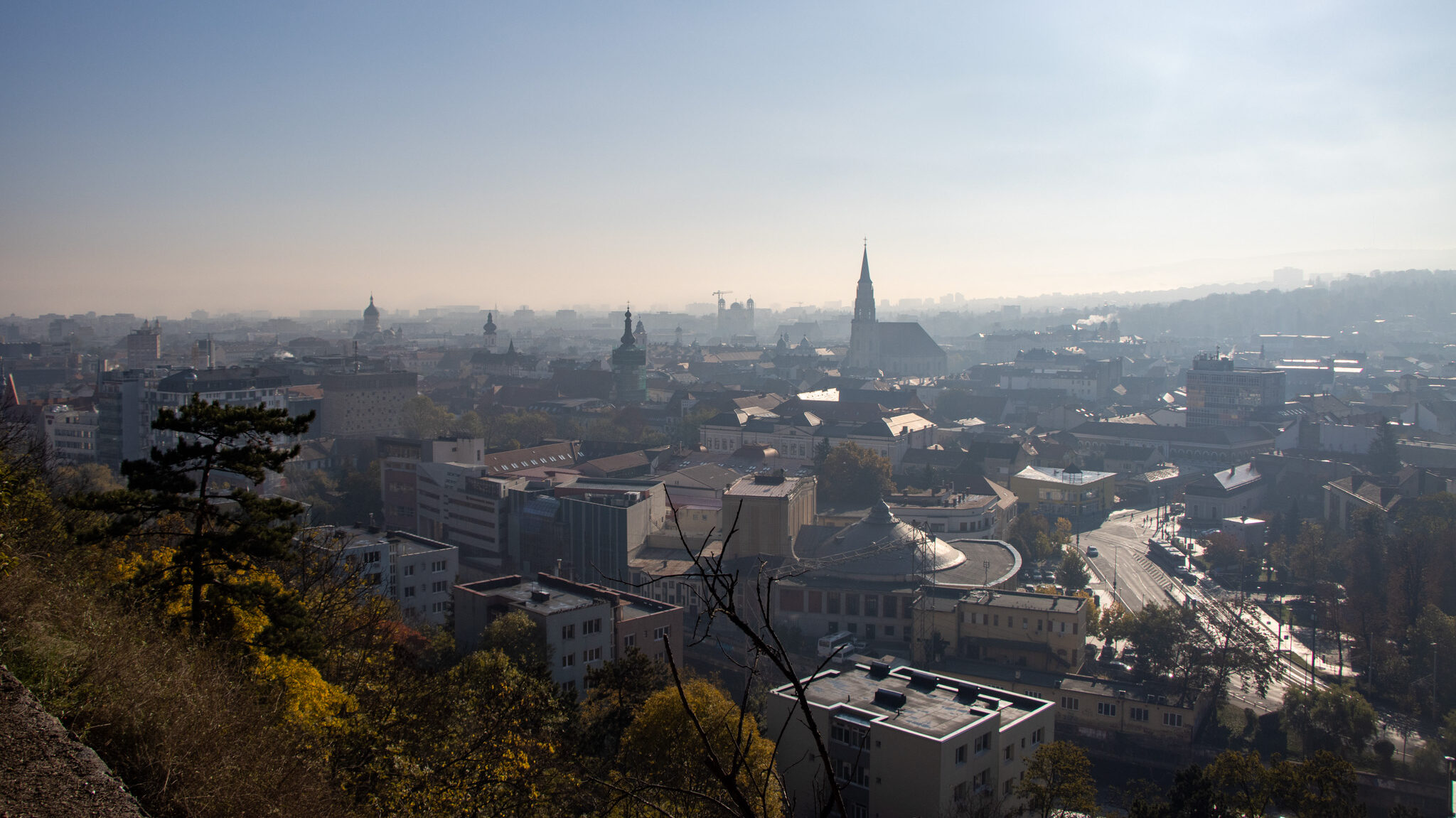 View of Cluj in the morning from hilltop park.