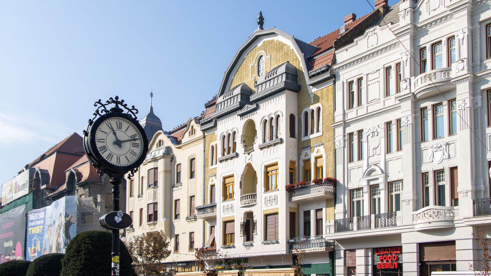 Buildings along large square in Timisoara.