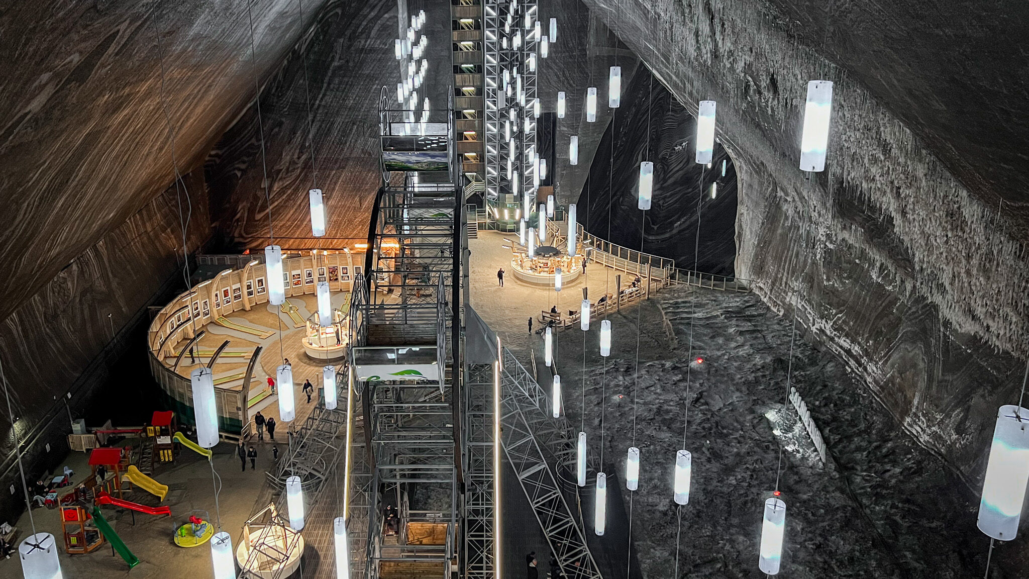 Turda Salt Mine Romania | Krista the Explorer View of large open salt mint with rides.