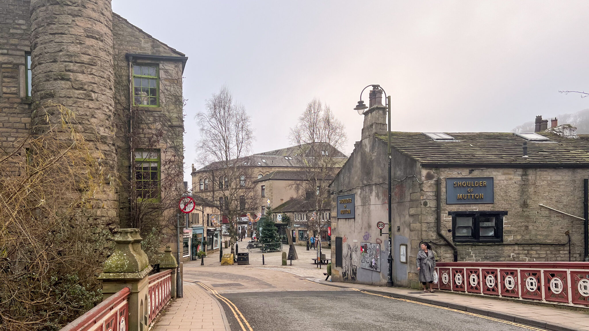 Small historic market town on cloudy day.