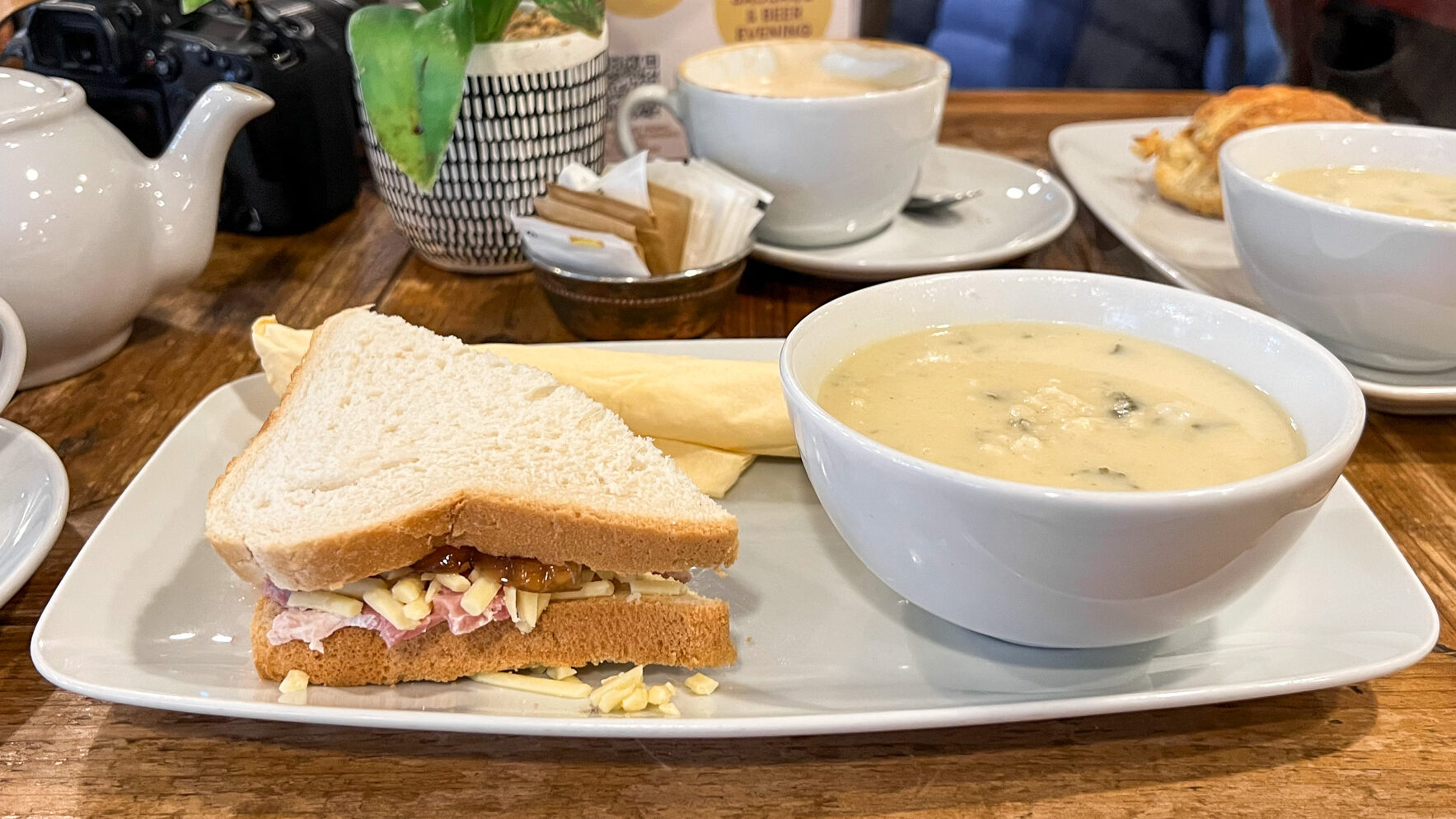 Cauliflower soup with cheese sandwich.