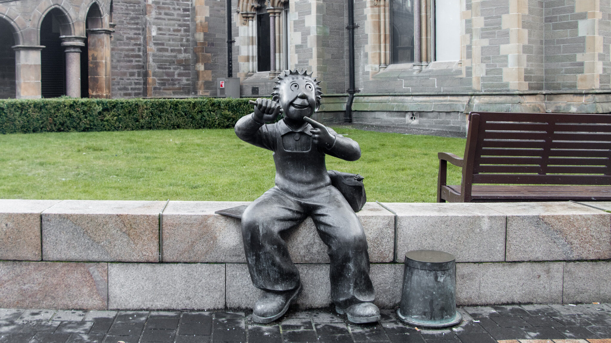 Bronze statue of Oor Wullie in front of gallery.