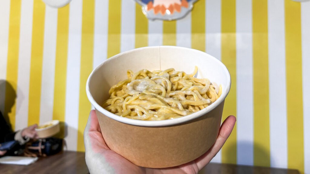Pasteria Rome | Krista the Explorer Bowl of carbonara in small pasta shop.
