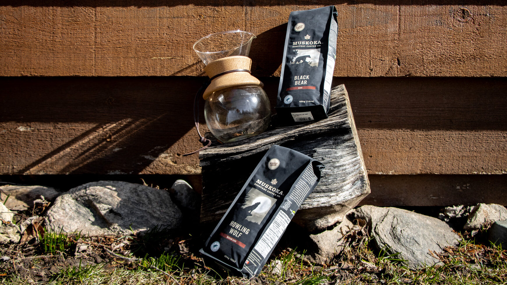Muskoka Roastery Ontario | Krista the Explorer Two bags of Canadian coffee beans next to shed.