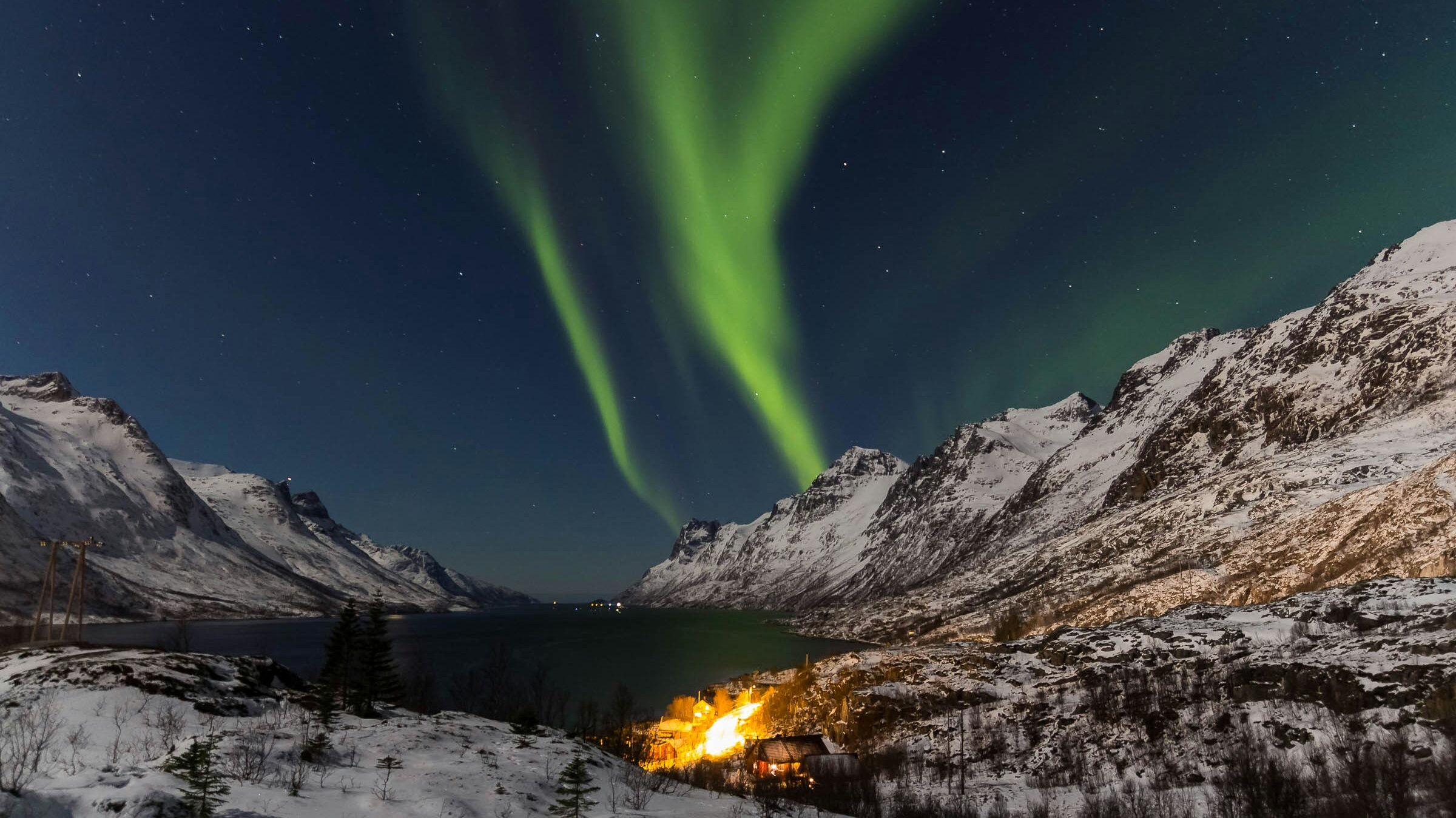 Northern Lights Arctic | Krista the Explorer View of the Northern Lights over mountain.
