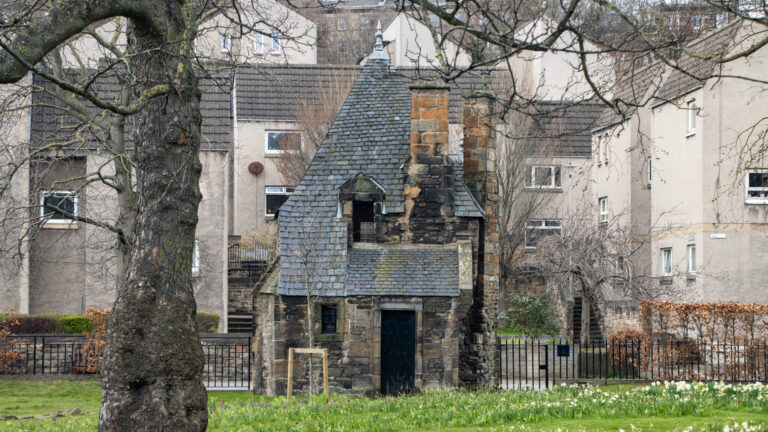 Small stone house used as bath house.