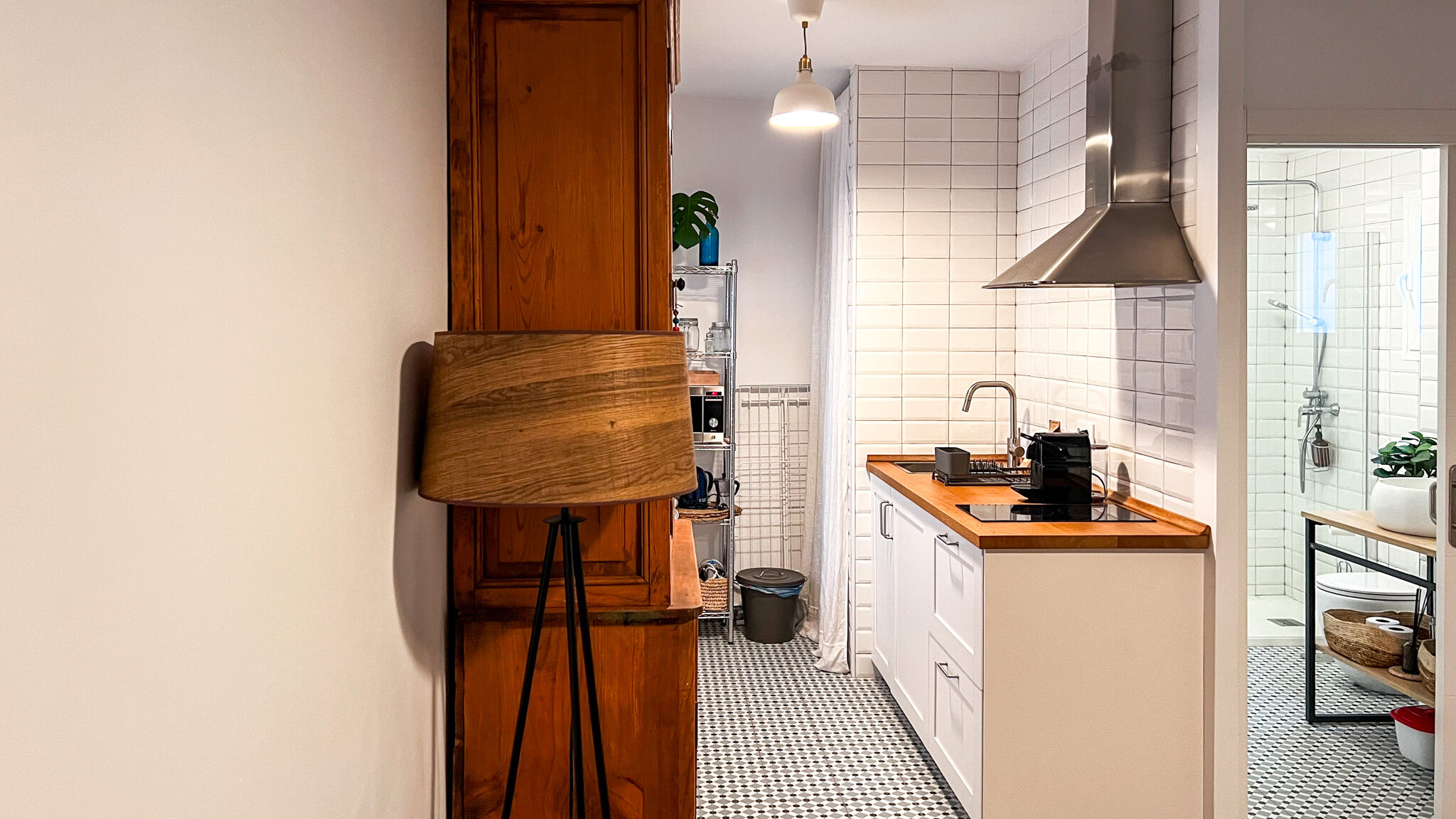 Casa Bekkeve Vejer | Krista the Explorer Modern kitchen with bathroom next to it.
