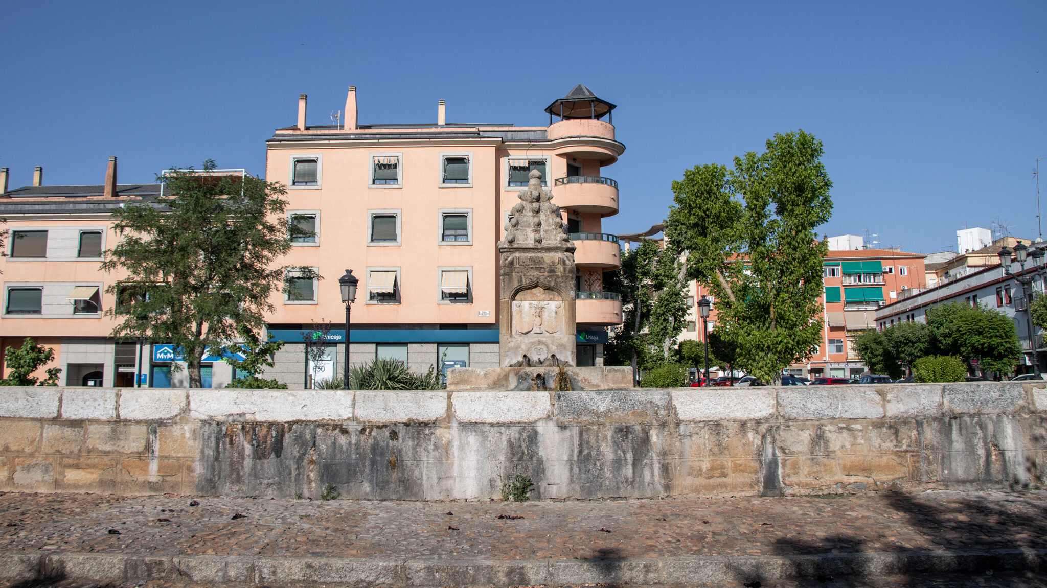 Pilar del Duque Zafra | Krista the Explorer Remains of old stone pilar in open-air plaza.