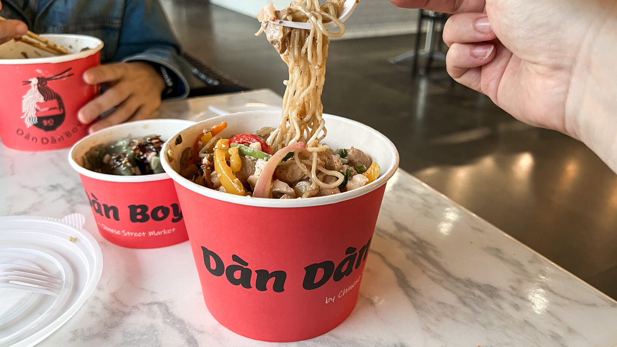 Union Market Washington | Krista the Explorer Pot of noodles and side of Chinese dumplings.