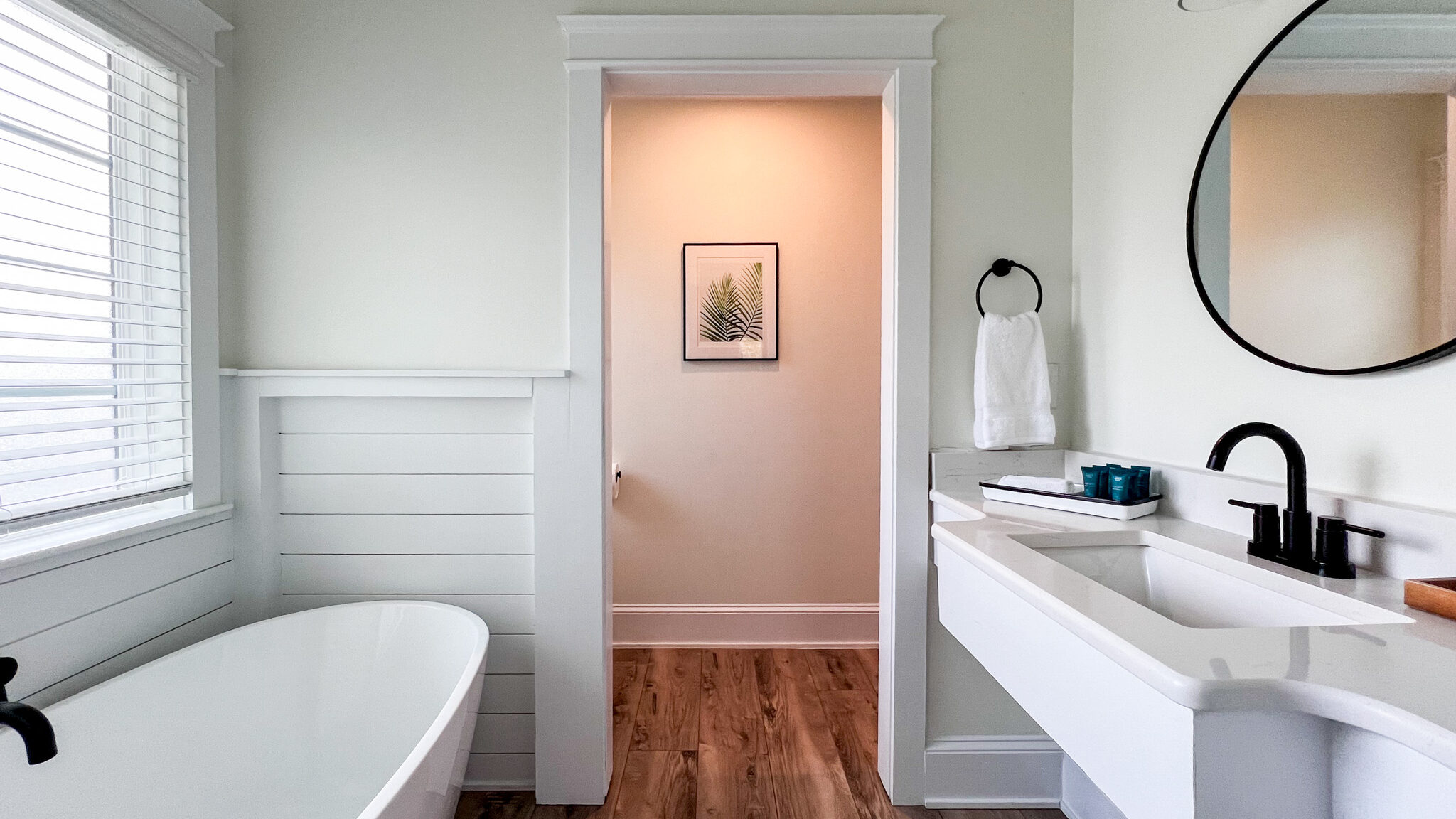Inn at Old Beach Virginia | Krista the Explorer Modern bathroom with large tub and walk-in shower.