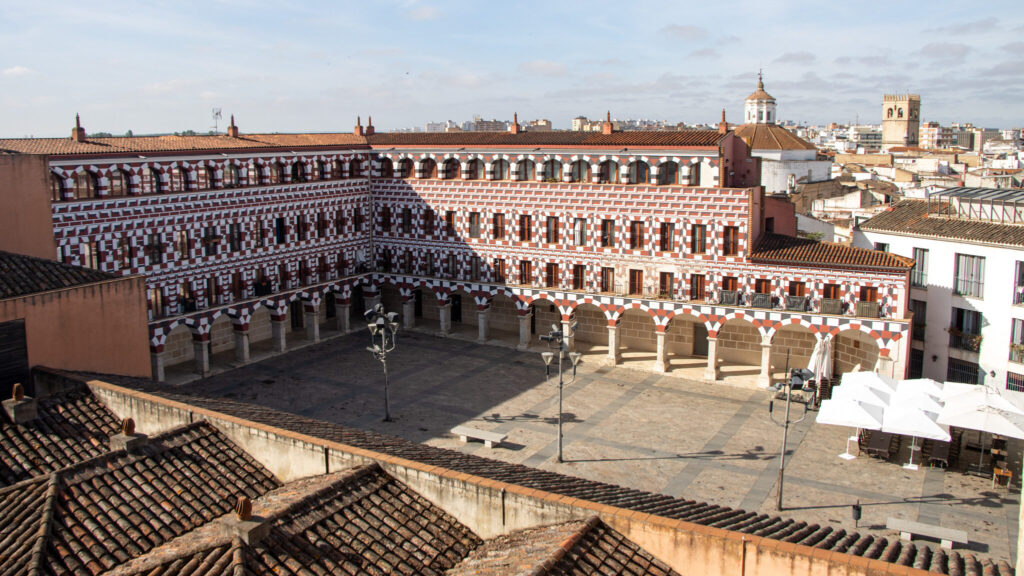 View of colourful plaza in old town.