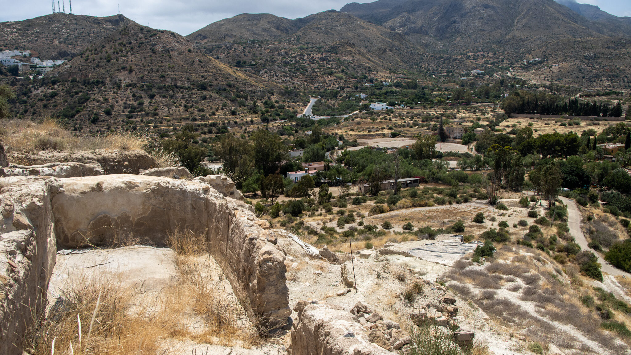 Yacimiento Arqueologico de Mojacar la Vieja | Krista the Explorer Neolithic and medieval archaeological site on hill.
