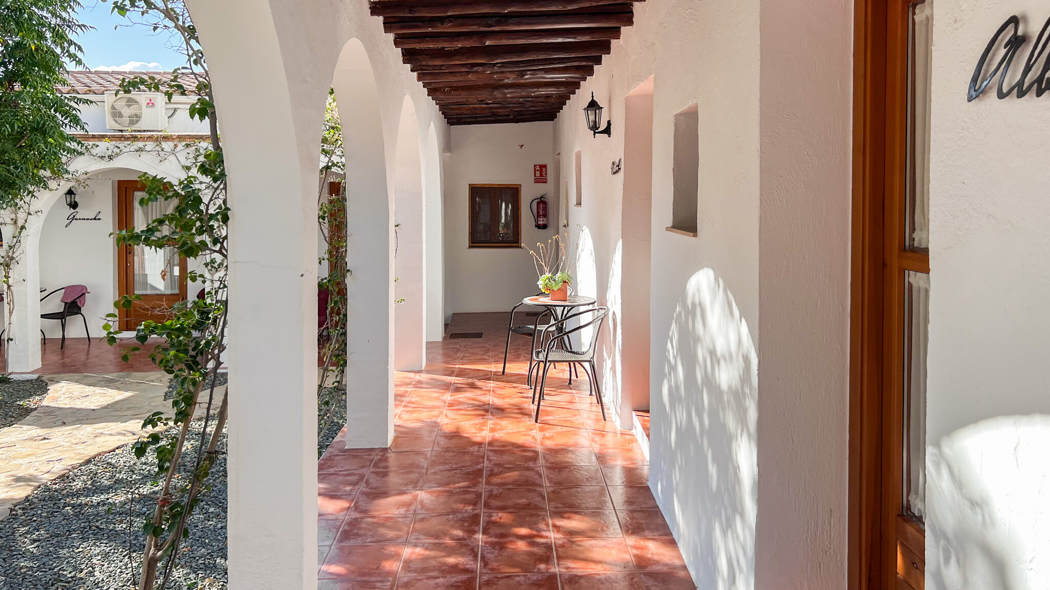 El Cortijo Mojacar | Krista the Explorer Andalusian courtyard with rooms.