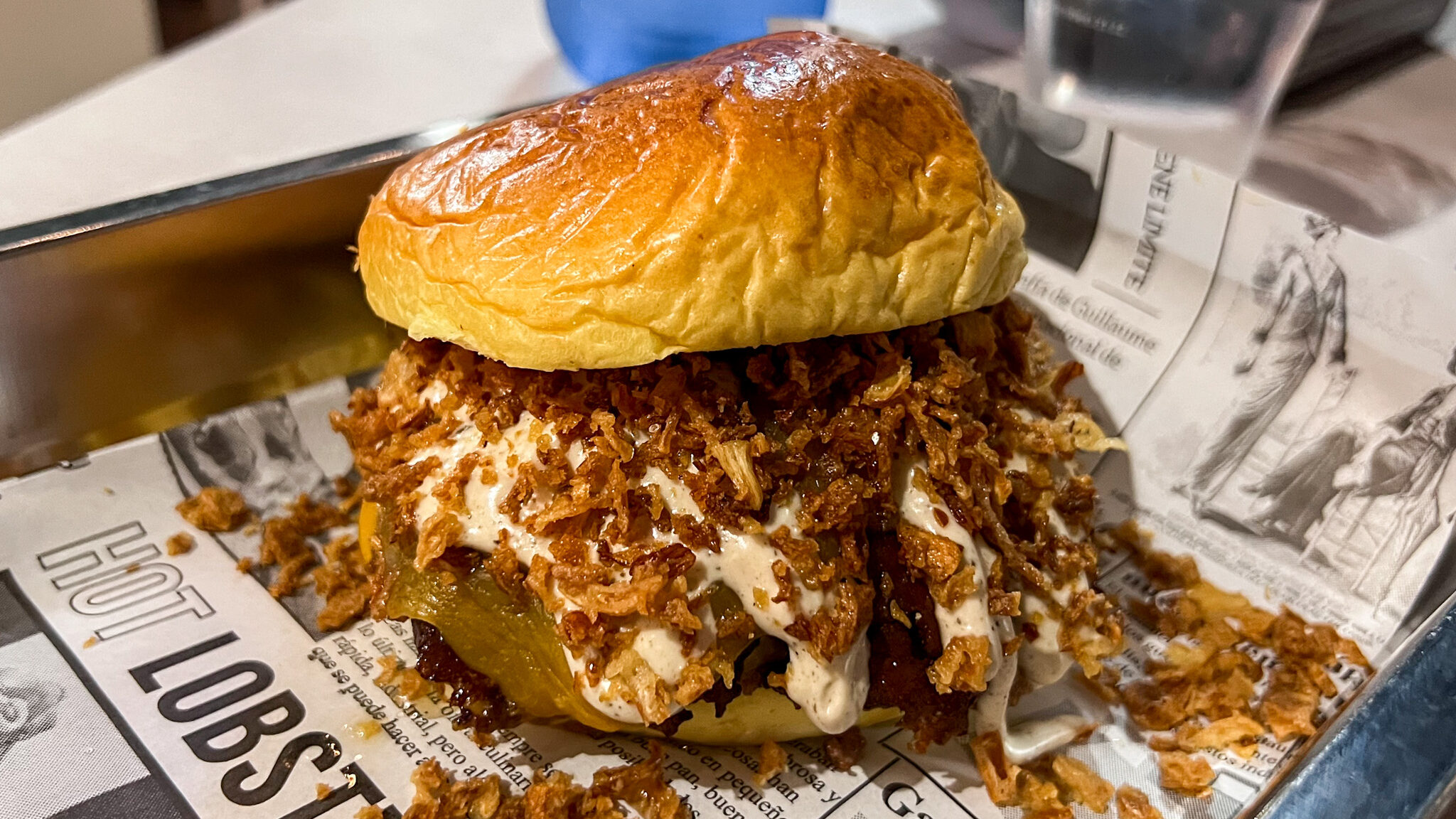 Delacalle Smash Burger Mojacar | Krista the Explorer Smash burger with loaded sauce and bacon.