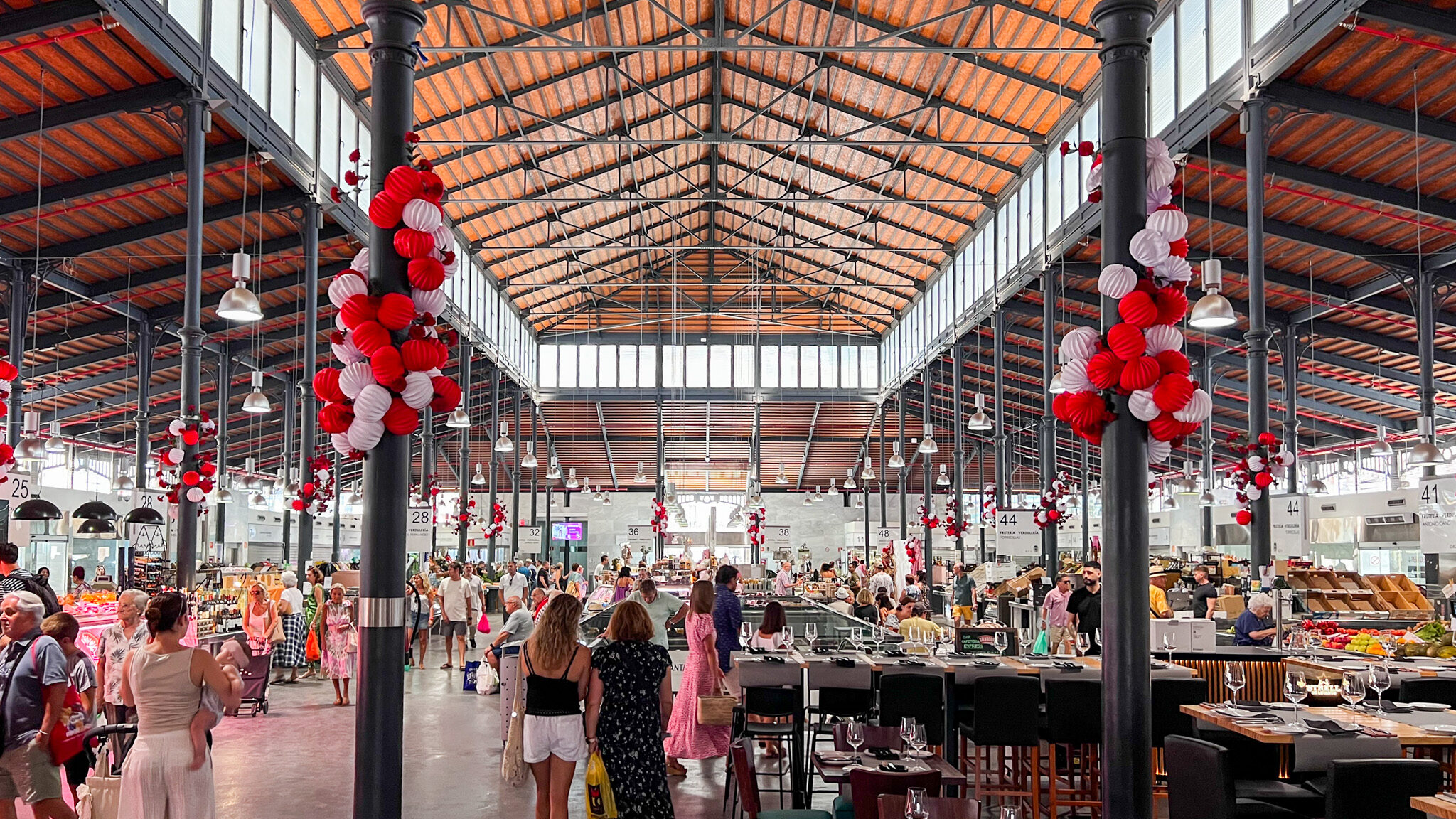 Interior of central market in Almeria with food stalls.