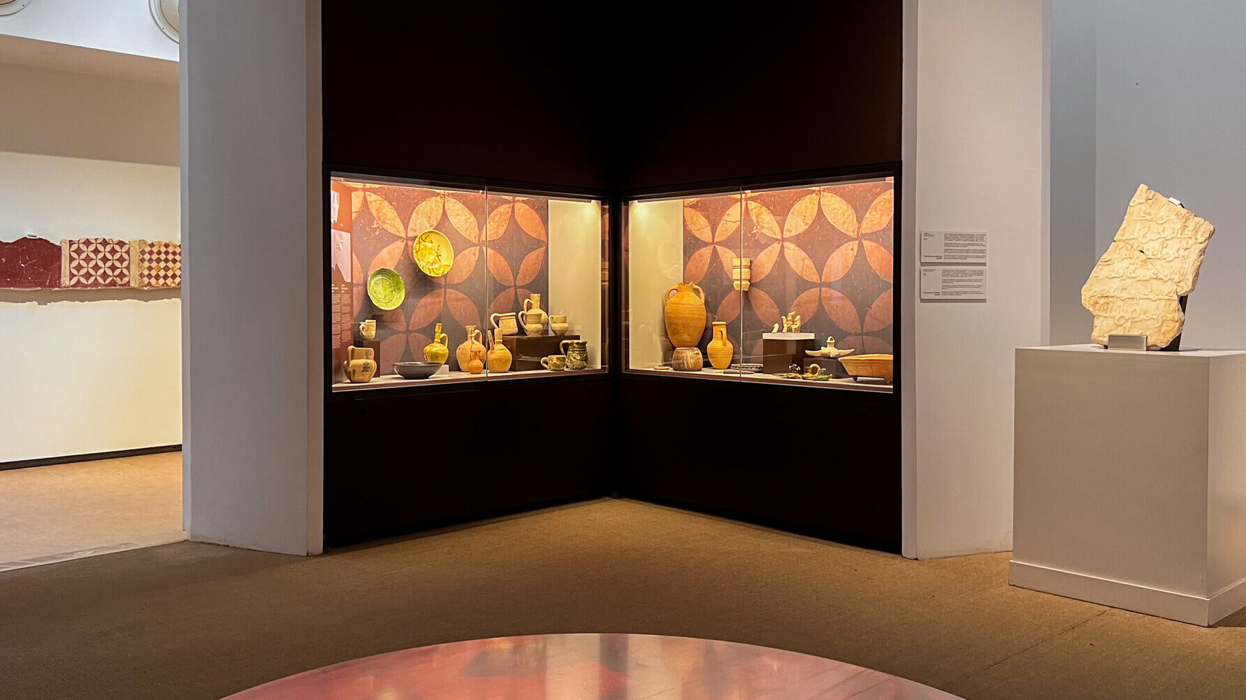 Exhibition inside Museum of Almeria with glass panels.