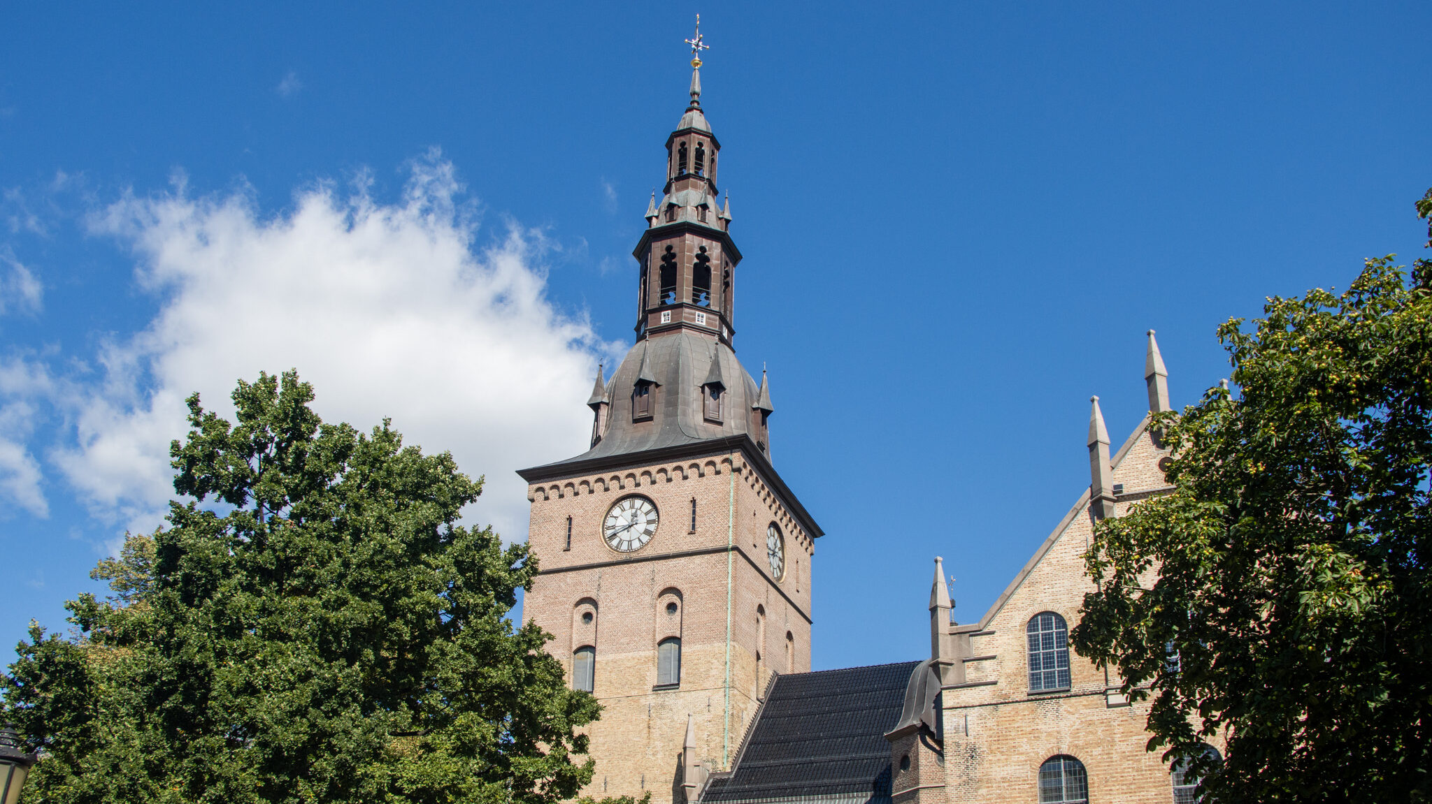 Oslo Cathedral | Krista the Explorer View of the tower of Oslo Cathedral on sunny day.
