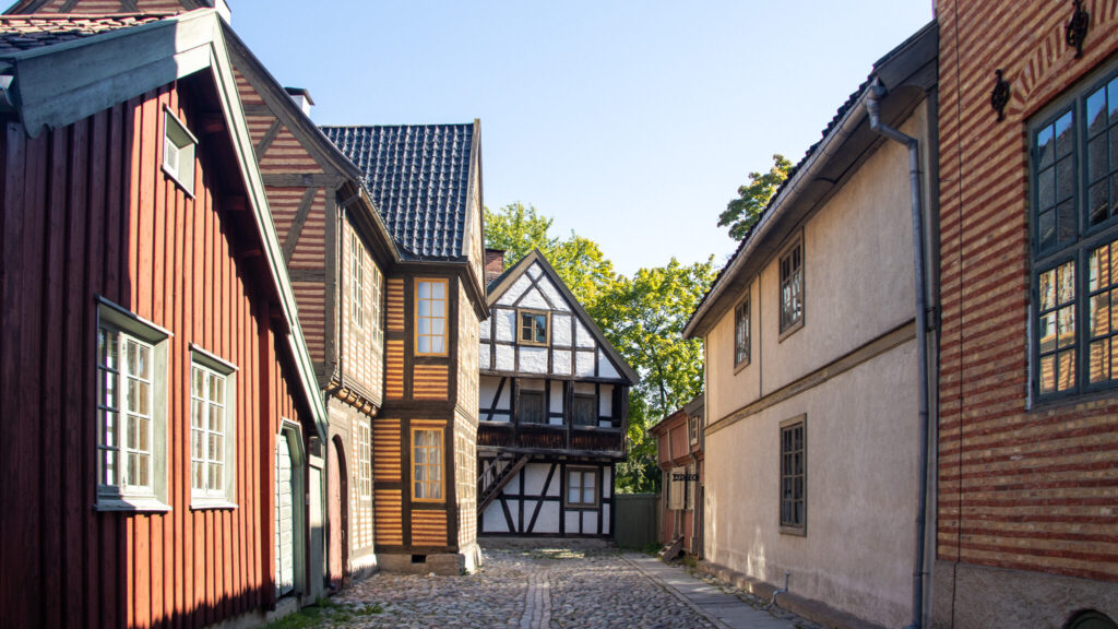 Norsk Folkemuseum Oslo | Krista the Explorer Historic street at open air museum best things to do in Oslo.