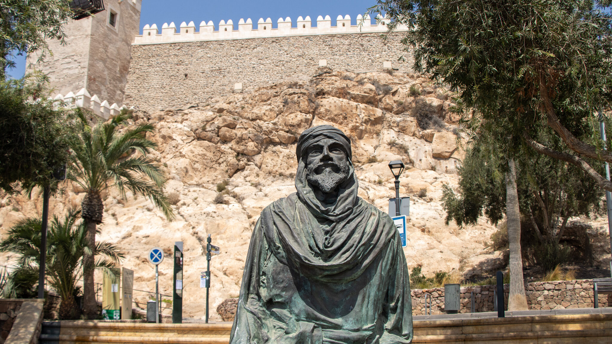Statue of Moorish man in front of Almeria fortress.
