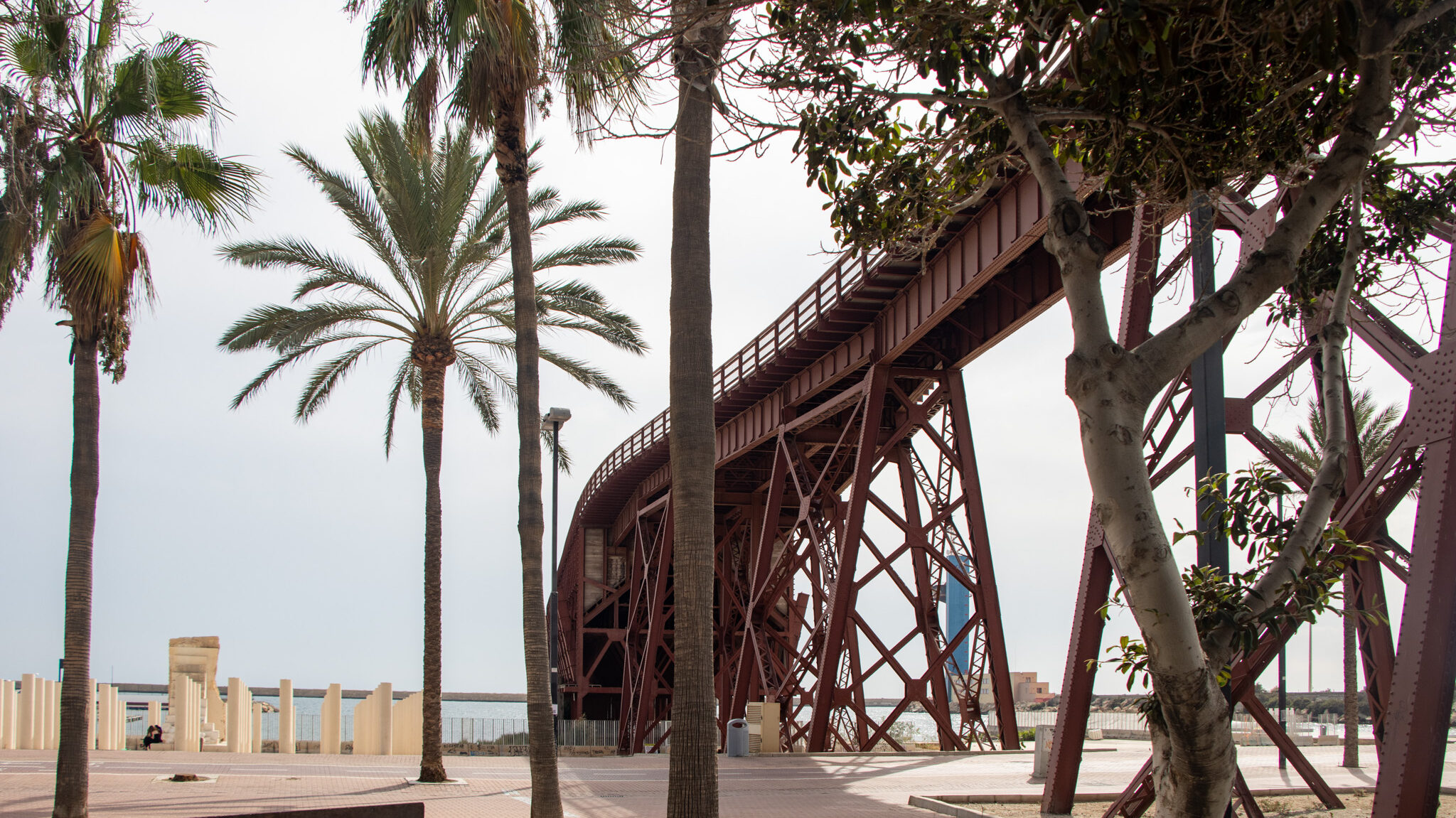 Old iron shipping bridge leading to the beach.