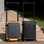 Two premium suitcases from LEVEL8 outside.