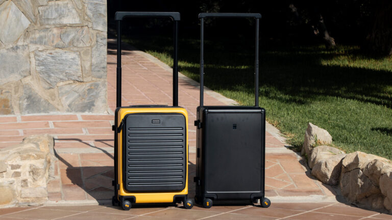 Two premium suitcases from LEVEL8 outside.