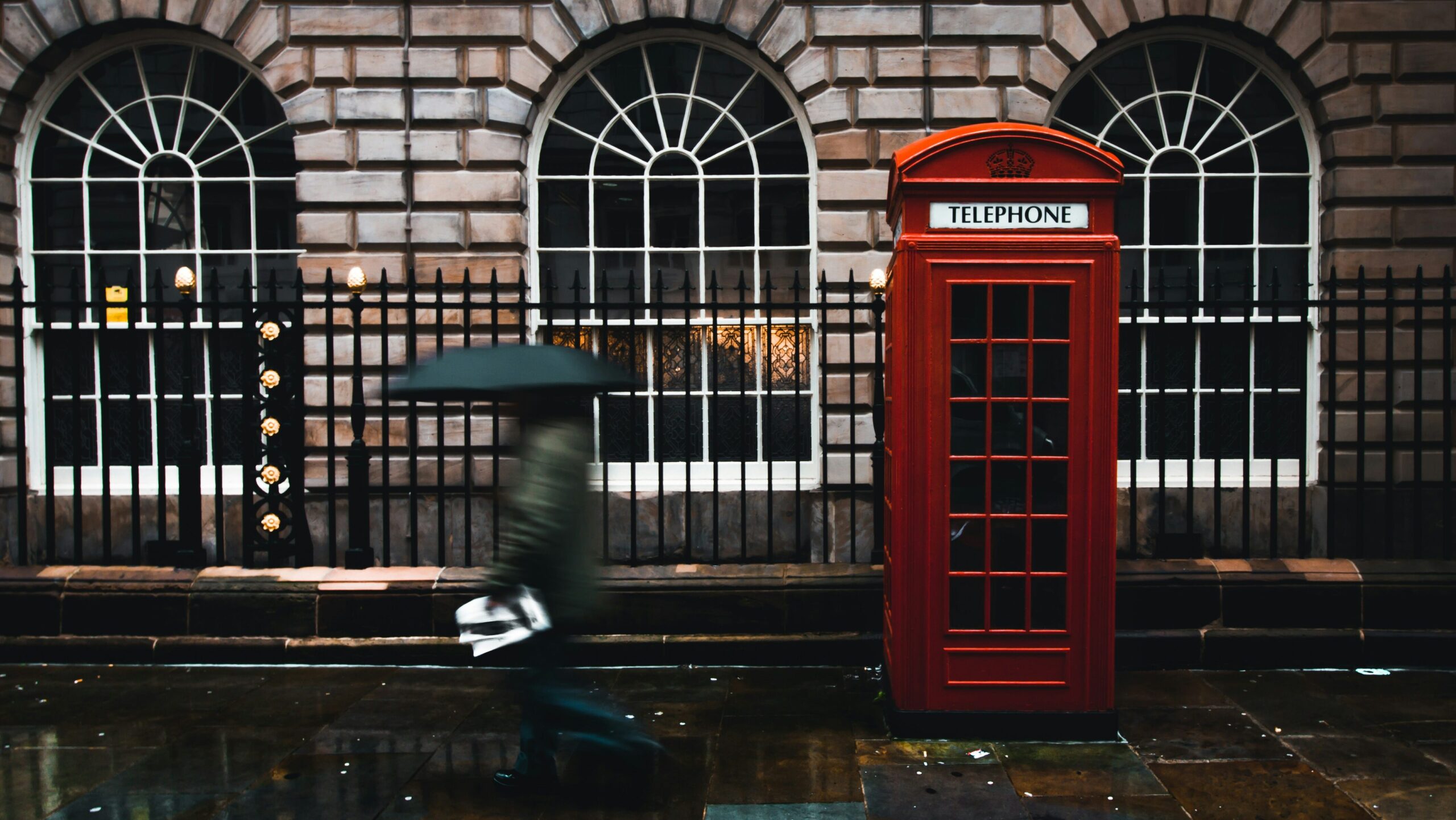 Rainy London | Krista the Explorer Red phone box on street in London.