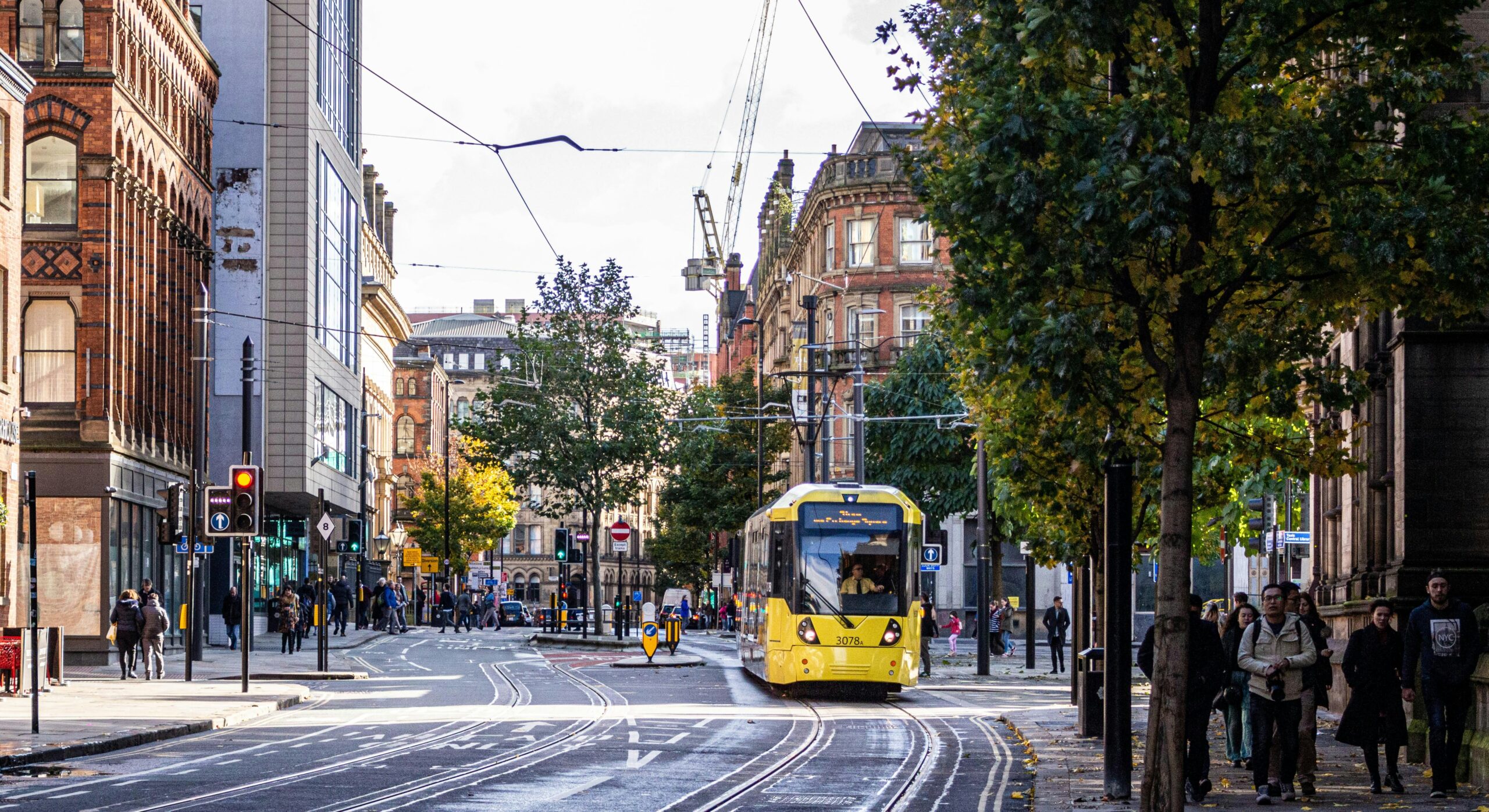 Manchester Tram | Krista the Explorer Yellow tram coming down main street in Manchester.