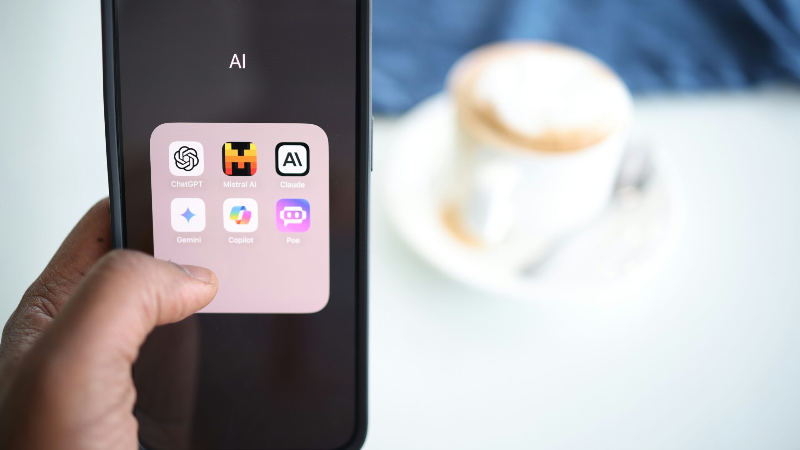 Technology AI | Krista the Explorer Smartphone with various AI apps in folder.