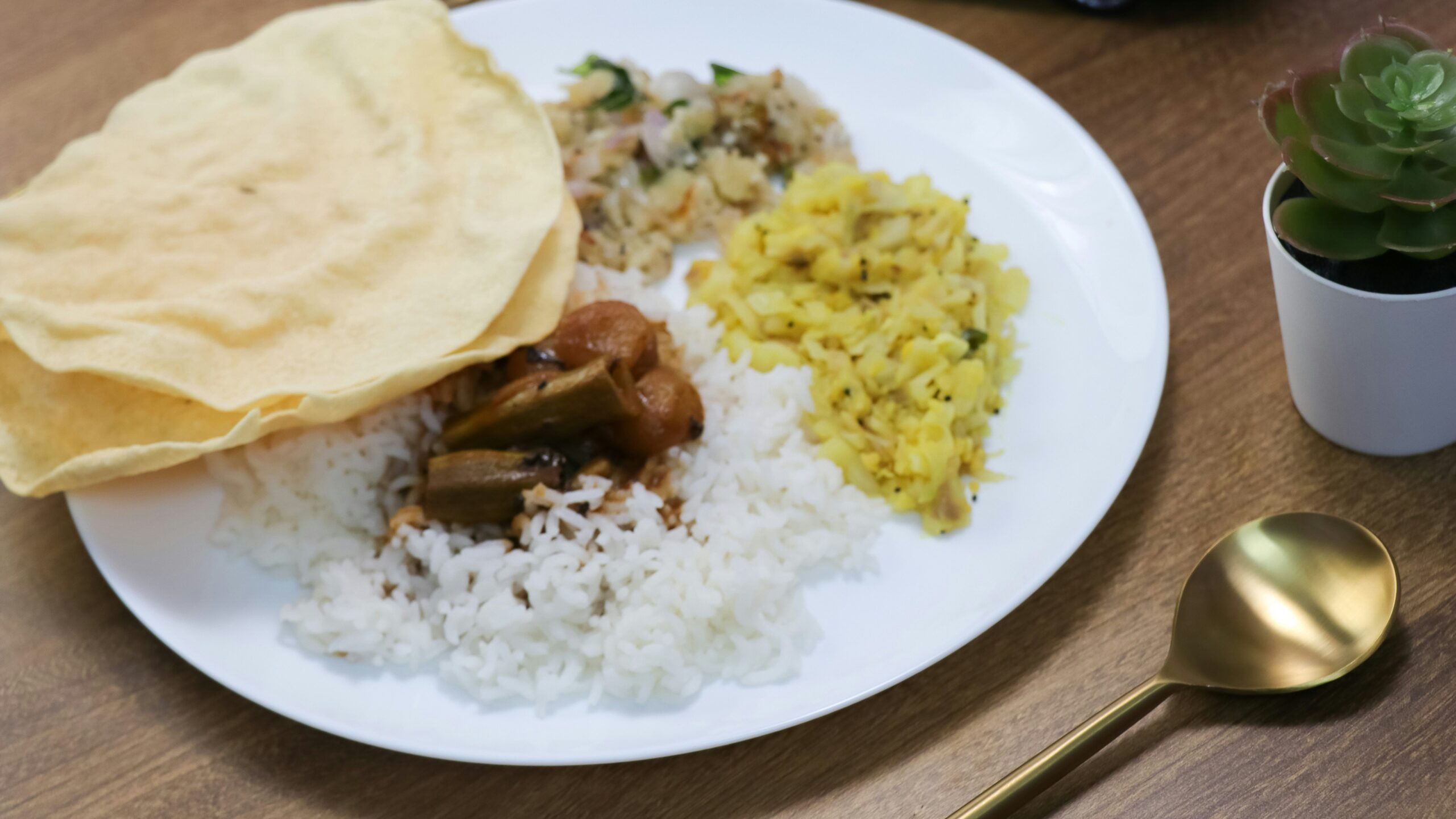 Manchester Food | Krista the Explorer Plate of curry with bread and rice.