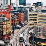 Aerial view of Manchester city centre on cloudy day.