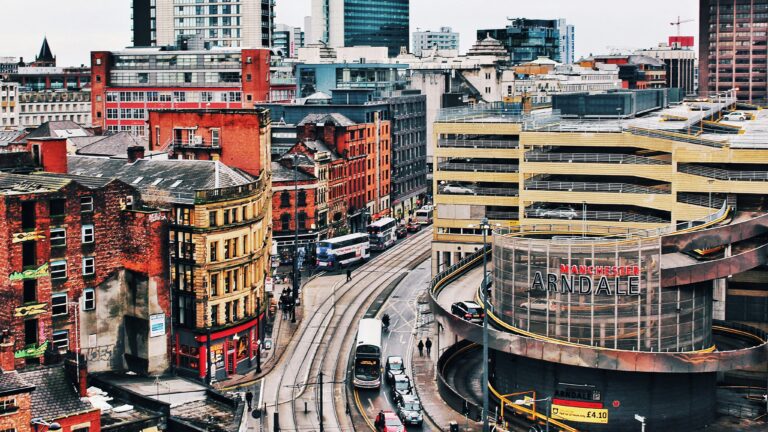 Aerial view of Manchester city centre on cloudy day.