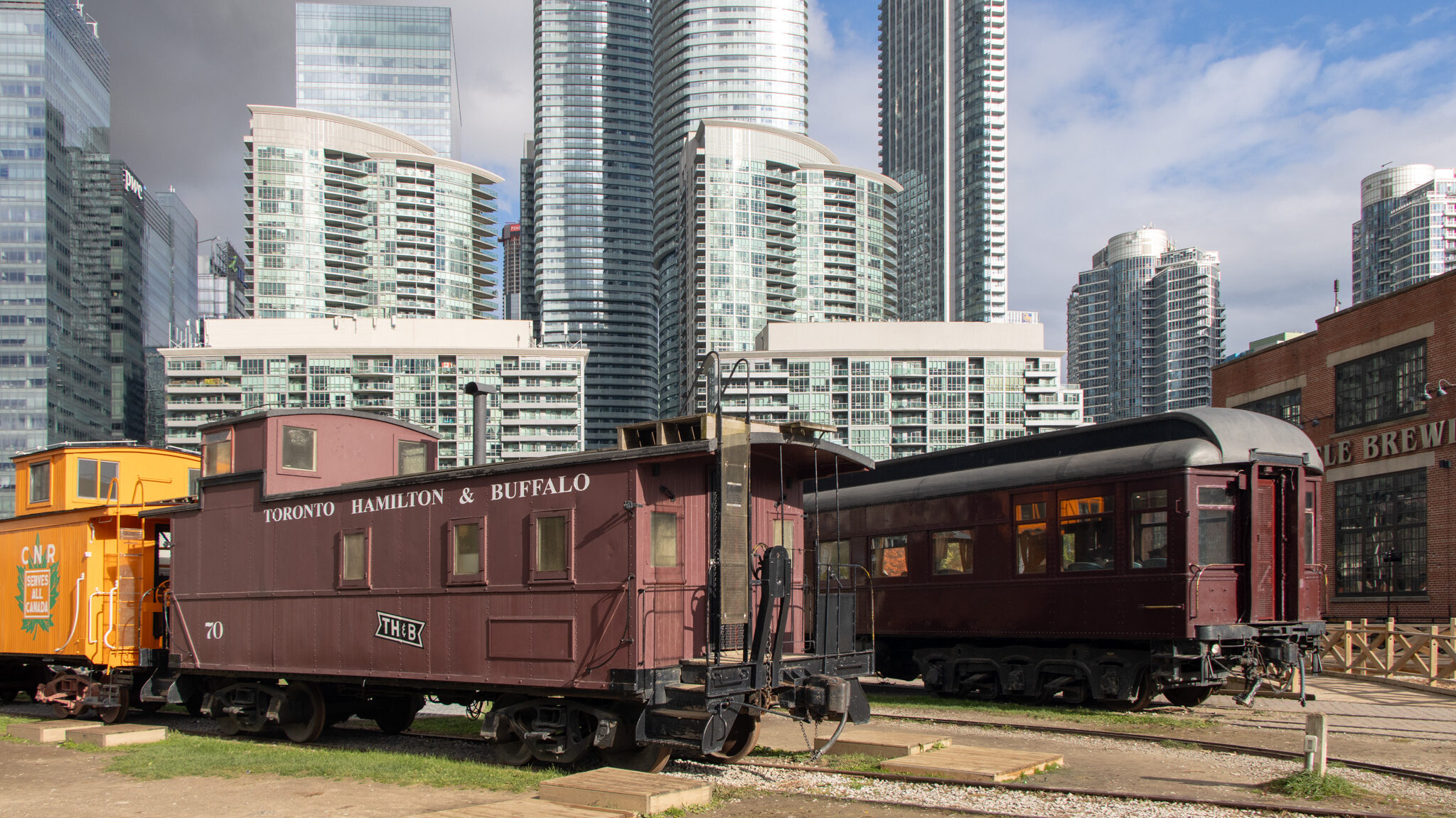 Trains Toronto | Krista the Explorer Historic train carriages parked in museum grounds.