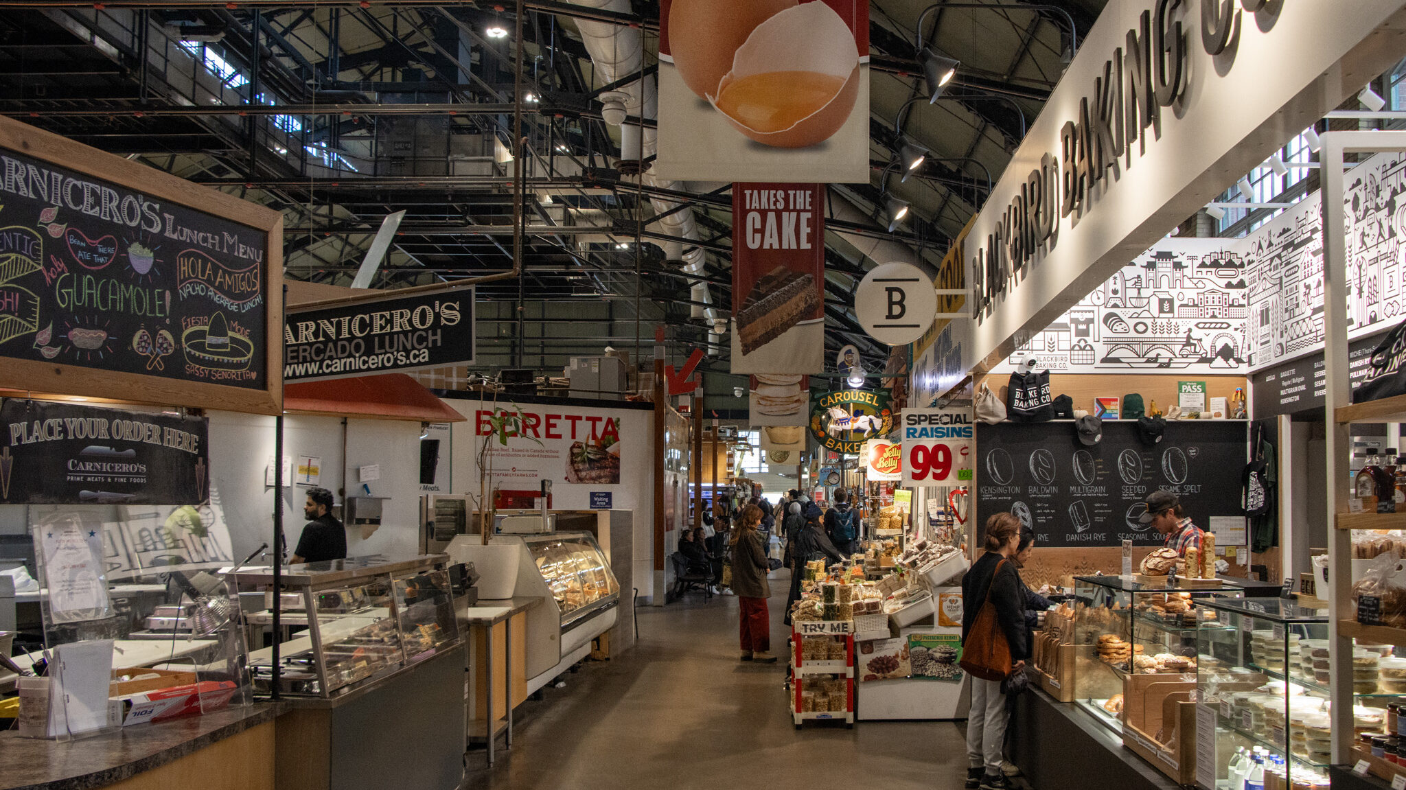 St Lawrence Market Toronto | Krista the Explorer Aisle with stalls inside food market in Toronto.