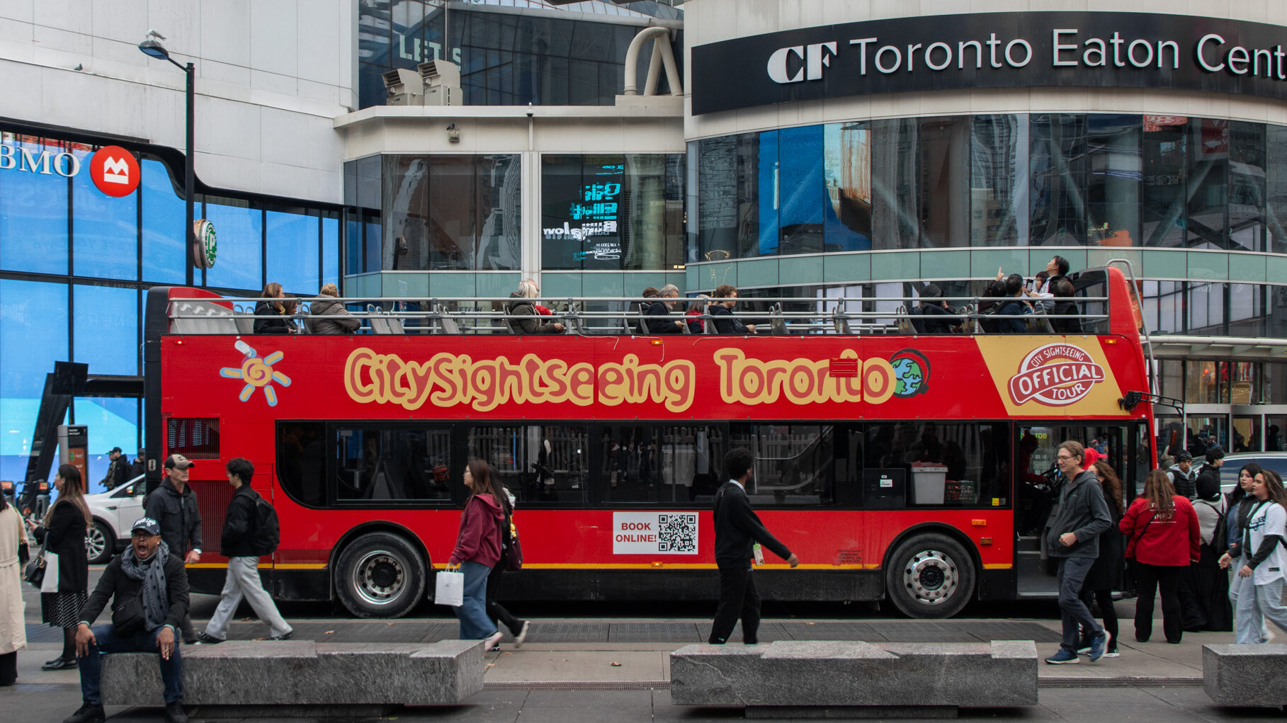 Sightseeing Toronto | Krista the Explorer Red open-top double decker bus in Toronto.