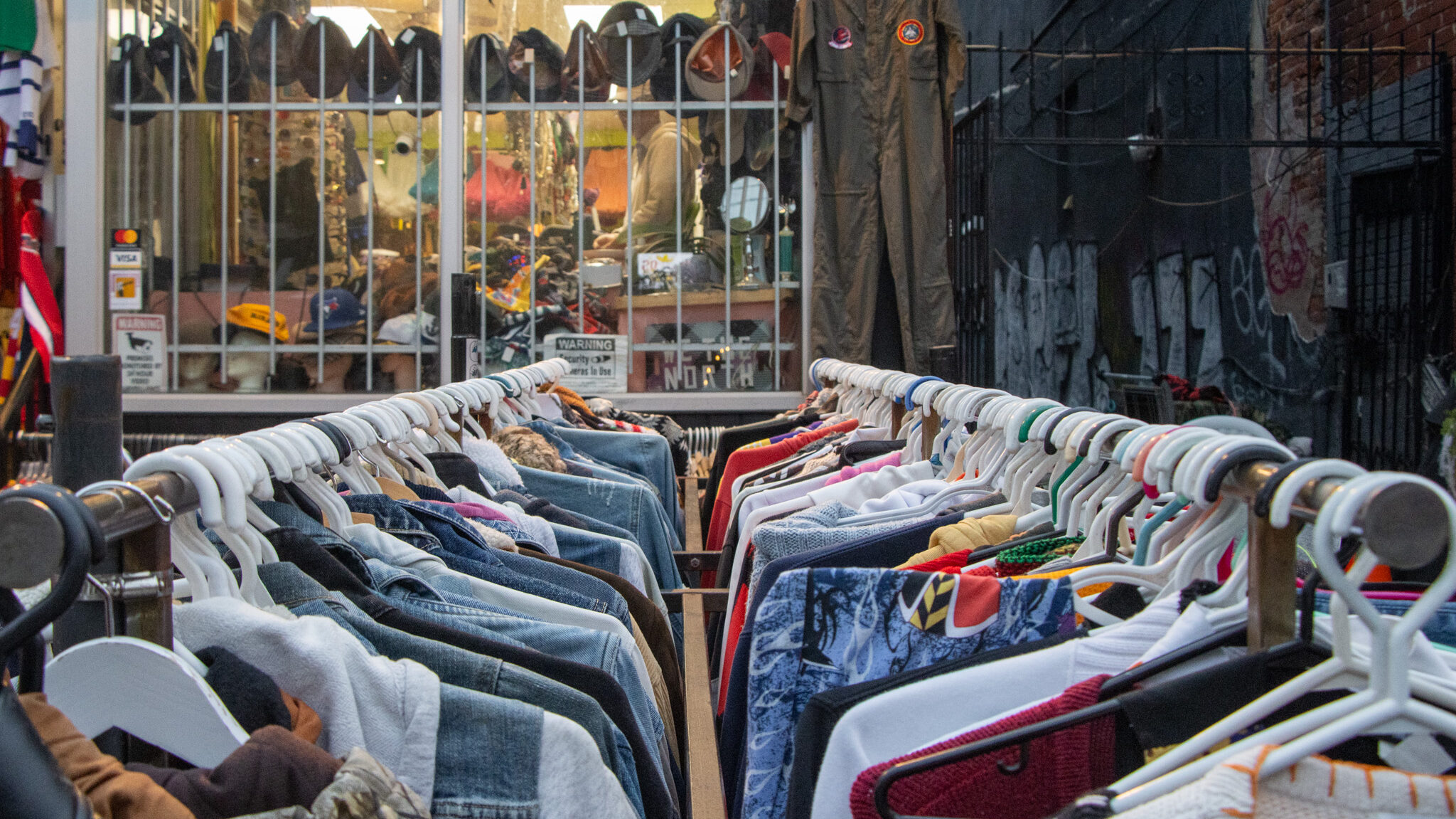 Kensington Market Toronto | Krista the Explorer Two rows of vintage clothing in Kensington Market.