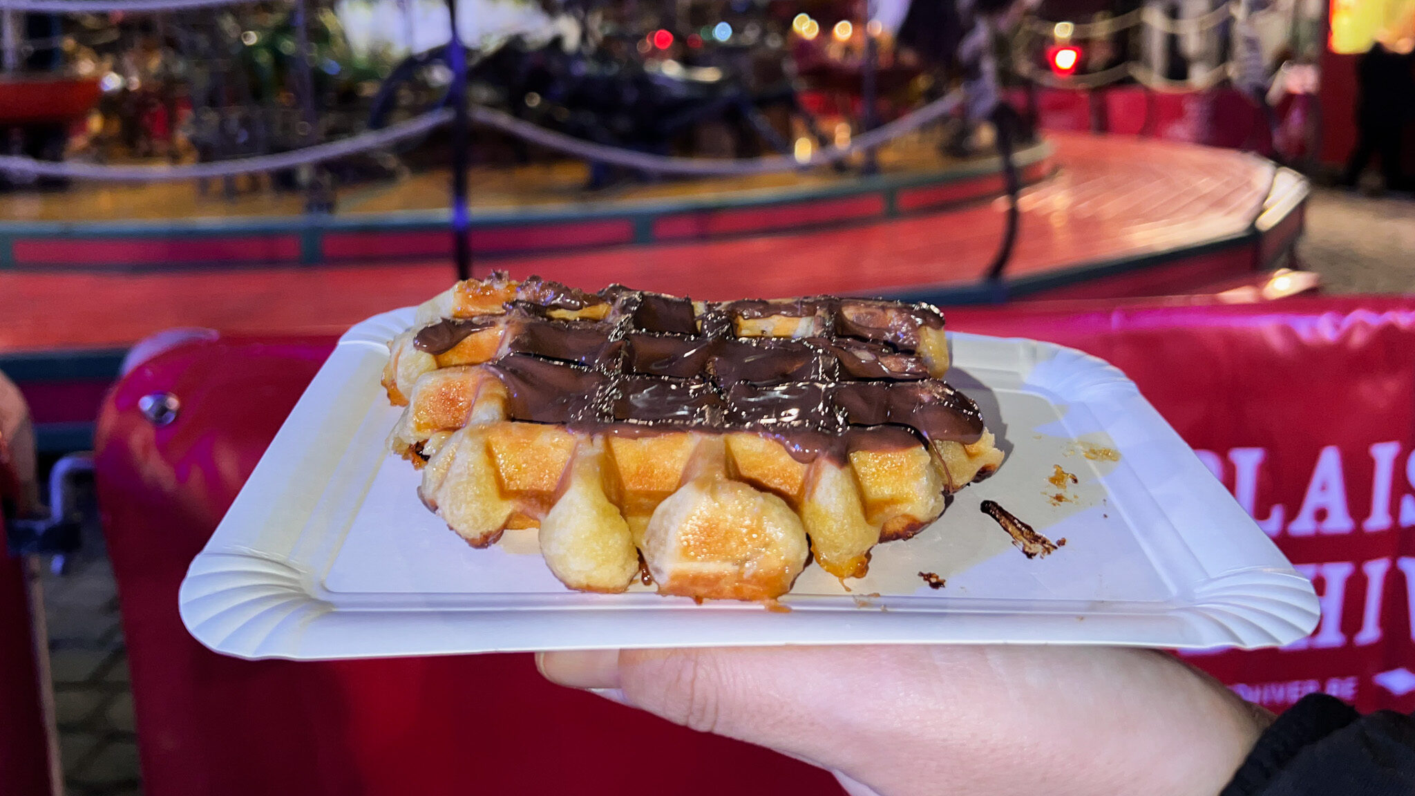 Belgian waffle with melted Nutella on top.
