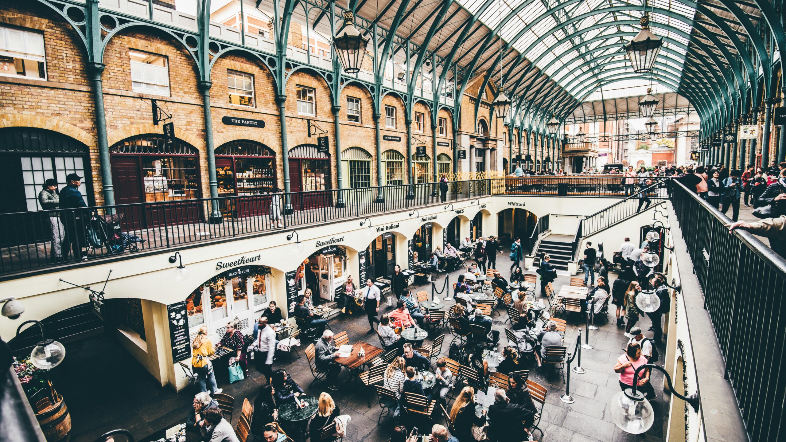 Covent Garden London | Krista the Explorer Covent Garden main hall full of people.